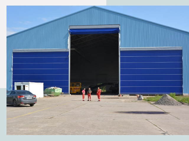 Ангарные ворота в Лесосибирск от СтальСтрой-Лсс по цене 625 руб.